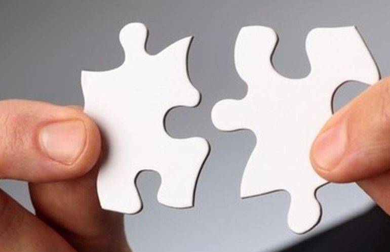 DuPont combines business divisions