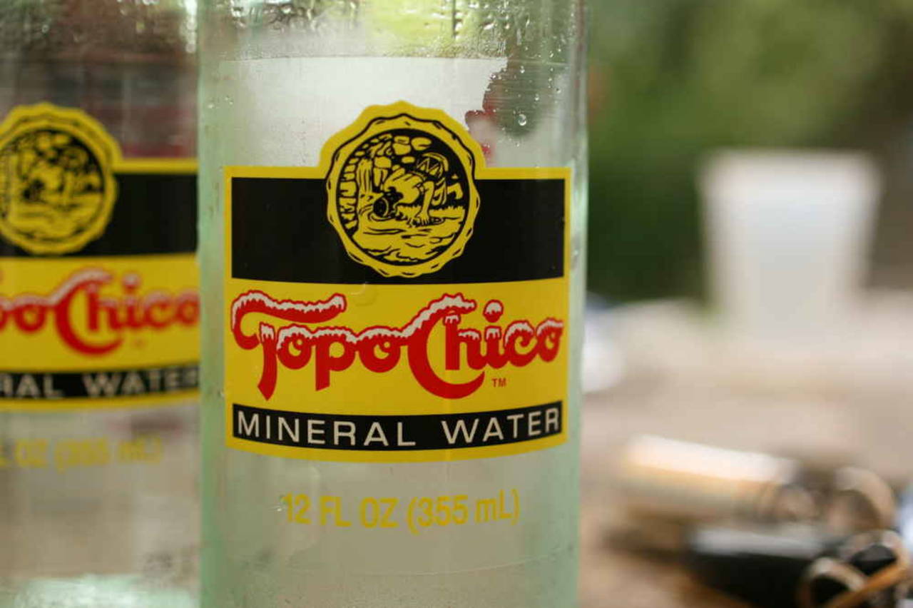 Arca Continental cede derechos de Topo Chico a Coca-Cola